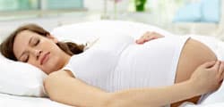 Как спать во время беременности